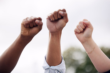 Image showing Anger, justice and fists of people at a protest for freedom, government change and fighting power. Angry, support and diversity and community with passion for social movement, politics and solidarity