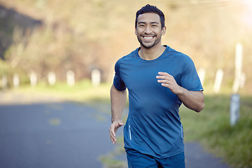 Image showing Man, smile in portrait and run outdoor, fitness and cardio with marathon, sports and athlete in nature. Asian male runner in road, happy with running exercise and training for race with mockup space