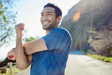 Image showing Fitness, thinking and stretching with a man runner outdoor in the mountains for a cardio or endurance workout. Exercise, sports and idea with a young male athlete getting ready for a run in nature