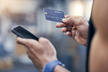 Image showing Ecommerce, man with smartphone and credit card for payments at gym with a lens flare. Subscription or membership, closeup and male athlete with cellphone with bank information for online shopping