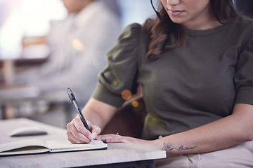 Image showing Hands, call center and woman writing in notebook, planning and schedule in office. Telemarketing, book and business person taking notes for reminder, sales list and information for customer service.