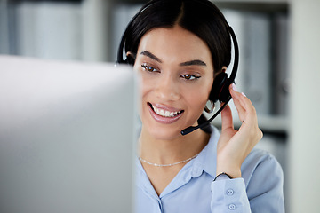 Image showing Customer service, woman with a headset and computer at her desk of her modern office workplace. Online communication or crm, support or telemarketing and female call center agent at her workspace