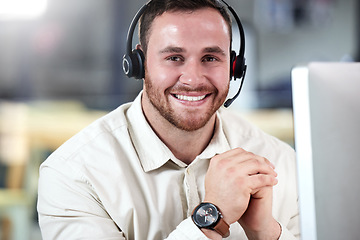 Image showing Customer service, portrait of a man with a headset and computer at his desk in a modern workplace office with smile. Telemarketing or online communication, support or crm and male call center agent