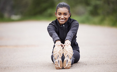 Image showing Nature, portrait of woman stretching legs and warm up, workout motivation and fitness mindset with hands on feet. Focus, commitment and girl on floor, leg stretch for outdoor run and exercise goals.