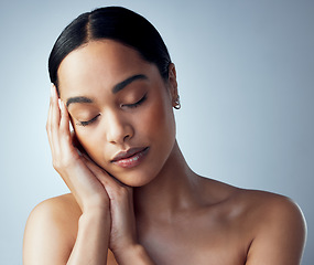 Image showing Skincare, face and woman in studio for natural, dermatology and cosmetic on grey background. Soft, skin and female model relax with calm, pamper and luxury glow or treatment, self love or routine