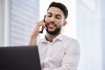 Image showing Phone call, laptop and businessman working in the office while talking on cellphone for communication. Happy, smile and professional male employee on mobile conversation while doing company research.