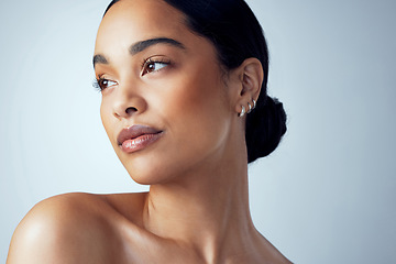 Image showing Thinking, skincare and woman in studio with natural beauty, cometic and wellness on grey background. Daydreaming, face and female model relax with dermatology, treatment and self care skin routine