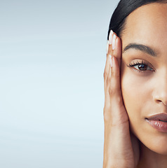 Image showing Portrait, half and skincare for woman in studio for cosmetic, wellness or treatment on grey background mockup. Hand, face and female model with natural beauty, soft and skin or dermatology result