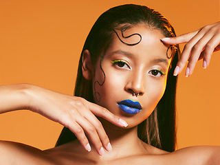 Image showing Neon cosmetics, makeup and portrait of woman in studio for hairstyle, eye shadow and beauty salon. Aesthetic, cosmetology and female person with blue lipstick for glamour, luxury style and face glow