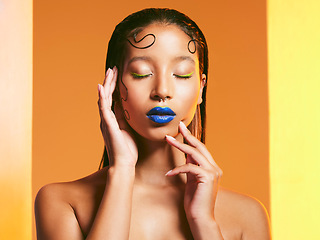 Image showing Makeup, cosmetic art and face of woman in studio for cosmetics, eye shadow and beauty salon. Creative aesthetic, cosmetology and female person with blue lipstick for glamour, luxury style and glow