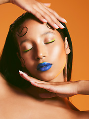 Image showing Neon makeup, cosmetics and face of woman in studio for art deco, eye shadow and beauty salon. Creative aesthetic, cosmetology and female person with blue lipstick for glamour, luxury style and glow