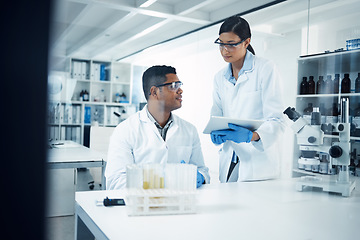 Image showing Scientists, tablet and teamwork in research at lab for science data, discovery or results. Man and woman medical professional team working with technology for scientific experiment in the laboratory