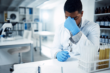 Image showing Science, stress and man scientist with headache in a laboratory, frustrated and crisis. Healthcare, male and experiment fail with anxiety migraine by health expert with forensic mistake in a lab