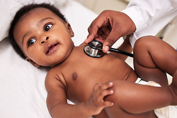 Image showing African, little baby and stethoscope in bed for health checkup or pediatrician with infant or healthcare clinic and medical wellness. Child patient, cardiology and expert with toddler in hospital