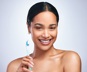 Image showing Woman, toothbrush and studio portrait with smile for self care, dental wellness or health by white background. Girl, dentistry model and toothpaste for brushing teeth, product and happy for cleaning