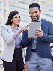 Image showing Business people, tablet and team outdoor in a city with internet connection for social media. A happy man and woman together on urban background with tech for networking, communication or online app