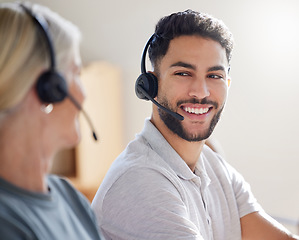 Image showing Call center, team and man with headset for support, customer service or telemarketing. Woman and male agent or consultant talking with a smile for sales, contact us and help desk or crm teamwork