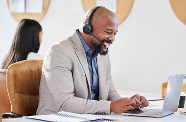 Image showing Laptop, call center and man with headset for customer service, support or telemarketing. Happy male person, agent or consultant typing online for sales deal, crm account and help desk or contact us