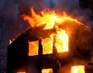 Image showing Wooden house in flames