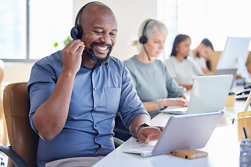 Image showing Black man, laptop and call center agent smile or sales consultant or customer service worker for inbound support in the office. Face, happy African and male pc operator or outbound or telemarketing