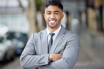 Image showing Portrait, business and man with arms crossed, city and smile with startup success, ceo or executive director. Face, male person or employee in a suit, outdoor or skills with a career and professional