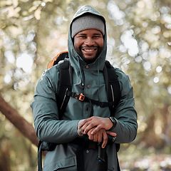 Image showing Black man, portrait smile and hiking in nature for travel, adventure and journey in the outdoors. Happy African male person or hiker smiling in trekking, walk or hike for fitness, workout or exercise