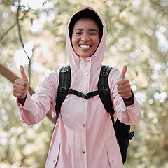 Image showing Black woman, portrait smile and hiking with thumbs up for success, winning or achievement in nature. Happy African female person or hiker smiling and showing thumb emoji, yes sign or like in trekking