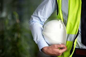 Image showing Construction worker, hand and safety gear with helmet for engineering and architecture project. Outdoor, mockup and engineering employee hands with safety vest for architect job and expert work