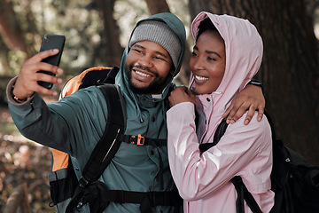 Image showing Black couple, hiking and hug for selfie, profile picture or vlog in travel adventure together in nature. African man and woman hiker hugging for photo, memory or social media and trekking in forest