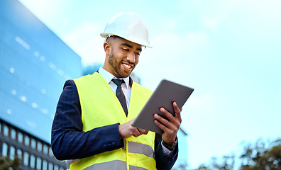 Image showing Research, tablet and a man construction worker in a city for planning, building or architectural design. Blue sky, technology and a male architect online in an urban town during the creative process