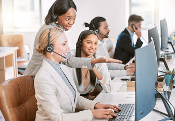 Image showing Call center, training and group of women at computer in discussion at help desk with advice from team leader. Learning, planning and help, black woman mentor coaching staff in customer service agency
