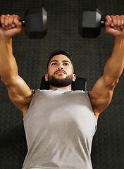 Image showing Bench press, fitness and man with weights in gym for exercise, bodybuilder training and workout. Sports, strong muscle and serious male person lifting weight for wellness, healthy body and strength