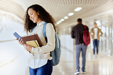 Image showing College student, books and woman with a phone at school for social media communication. Happy african person with backpack while typing on smartphone at university for education, research or schedule