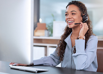 Image showing Customer service, computer and a woman consulting in her office for telemarketing, sales or assistance. Call center, support and crm with a happy young female employee working online using a headset