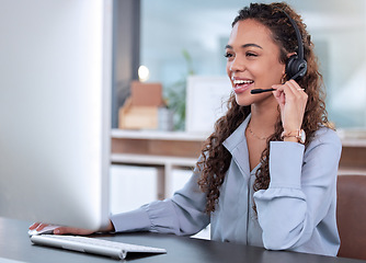 Image showing Call center, computer and a woman consulting in her office for telemarketing, sales or assistance. Customer service, support and crm with a happy young female employee working online using a headset