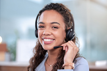 Image showing Portrait, call center and a woman consulting in an office for telemarketing or sales assistance. Customer service, smile or contact with a happy young consultant working in support using a headset