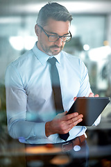 Image showing Typing email, app and a businessman with a tablet for communication, connection and internet. Digital, working and a mature employee reading information, agenda or schedule on technology in office