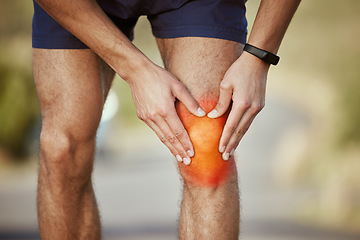 Image showing Man, hands and runner with knee pain, injury or sore inflammation on bone in the outdoors. Hand of male person or athlete holding painful area in sports leg accident, fitness or bruise from running