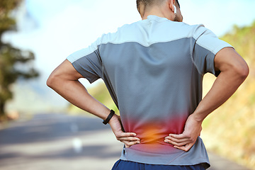 Image showing Man, back pain and fitness with injury, inflammation or ache from workout, running or sports exercise in nature. Rear view of male person holding painful area, sore spine or broken bone after run