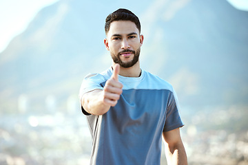 Image showing Fitness, man and outdoor with thumbs up for a run or workout with a smile for motivation. Portrait and hand of male athlete runner on mountain road for training, exercise or health and wellness goals