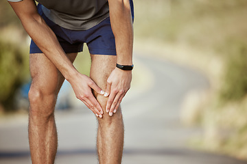 Image showing Man, hands and runner with knee pain in fitness, injury or sore inflammation on bone in the outdoors. Hand of male person or athlete holding painful leg area in sport accident or bruise from running