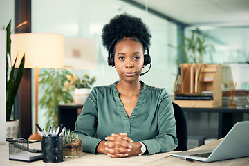 Image showing Portrait, black woman and serious in call center for business, customer service or telemarketing in office. Contact us, face and African female sales agent, support consultant or professional at work