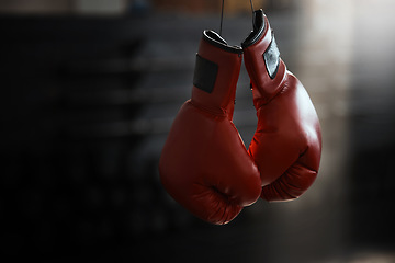 Image showing Empty, gym and boxing gloves for fitness, sports and training, wellness and healthy lifestyle. Protective, glove and fighting sport equipment at a health center for workout, endurance and challenge