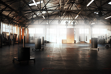 Image showing Empty gym, club or fitness space for training hall in open room or health studio for exercise or workout. Modern interior, background or facility building for sports equipment or healthy lifestyle