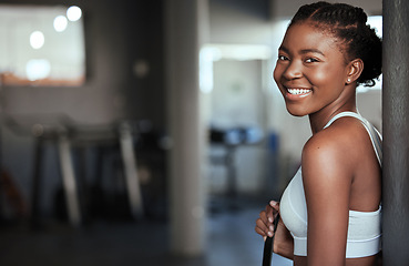 Image showing Break, portrait or happy black woman at gym for a workout, exercise or training for healthy body or fitness. Face of sports girl or proud African athlete smiling or relaxing with positive mindset