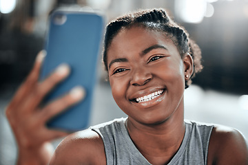 Image showing Happy african woman, gym selfie and smile for fitness, workout and wellness on floor with social media app. Influencer girl, photography and blog for exercise, performance and health for lifestyle