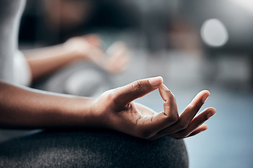 Image showing Yoga in gym, hands or woman in meditation in lotus pose with zen peace or mindfulness in blurry studio. Closeup, chakra or relaxed girl in pilates exercise workout for spiritual wellness or self care