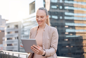 Image showing Smile, businesswoman with tablet and happy in city background outdoors. Social media or connectivity, online communication and networking with female person writing an email on rooftop of building