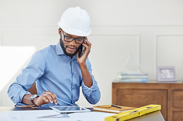 Image showing Planning, man architect with smartphone and tablet at his desk in his workplace office. Architecture, industrial and male construction worker on a cellphone on a call at his workspace with ppe