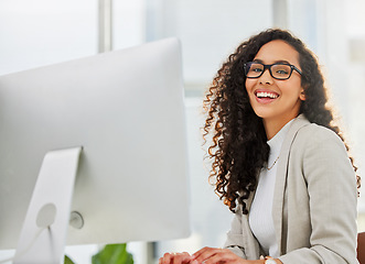 Image showing Computer, smile and portrait of insurance agent or business woman in corporate company with success and startup growth. Happy, online and employee or entrepreneur working on agency project in office